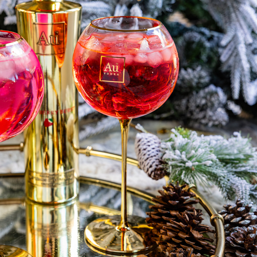 Verre à bulles à pied doré Au 