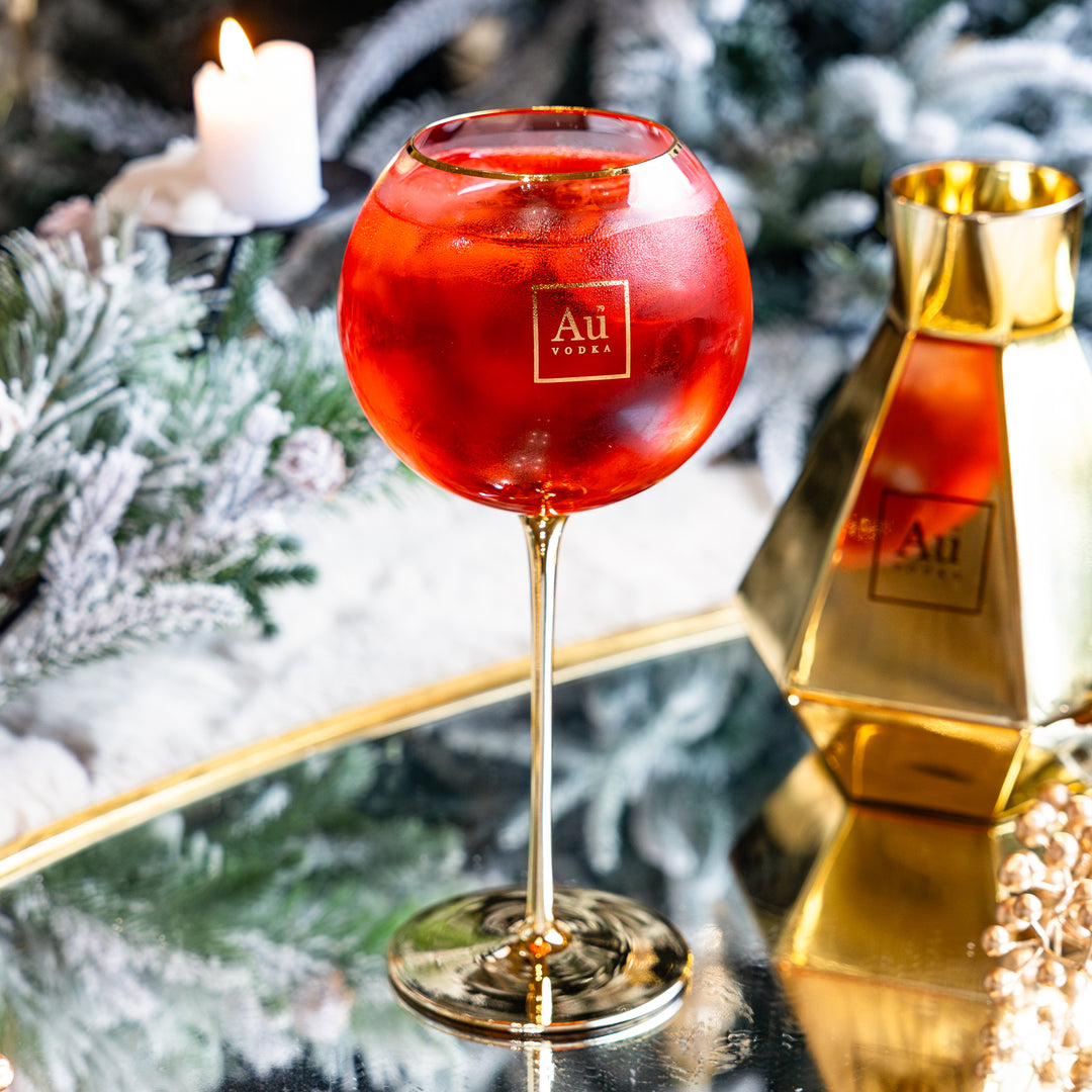Verre à bulles à pied doré Au 